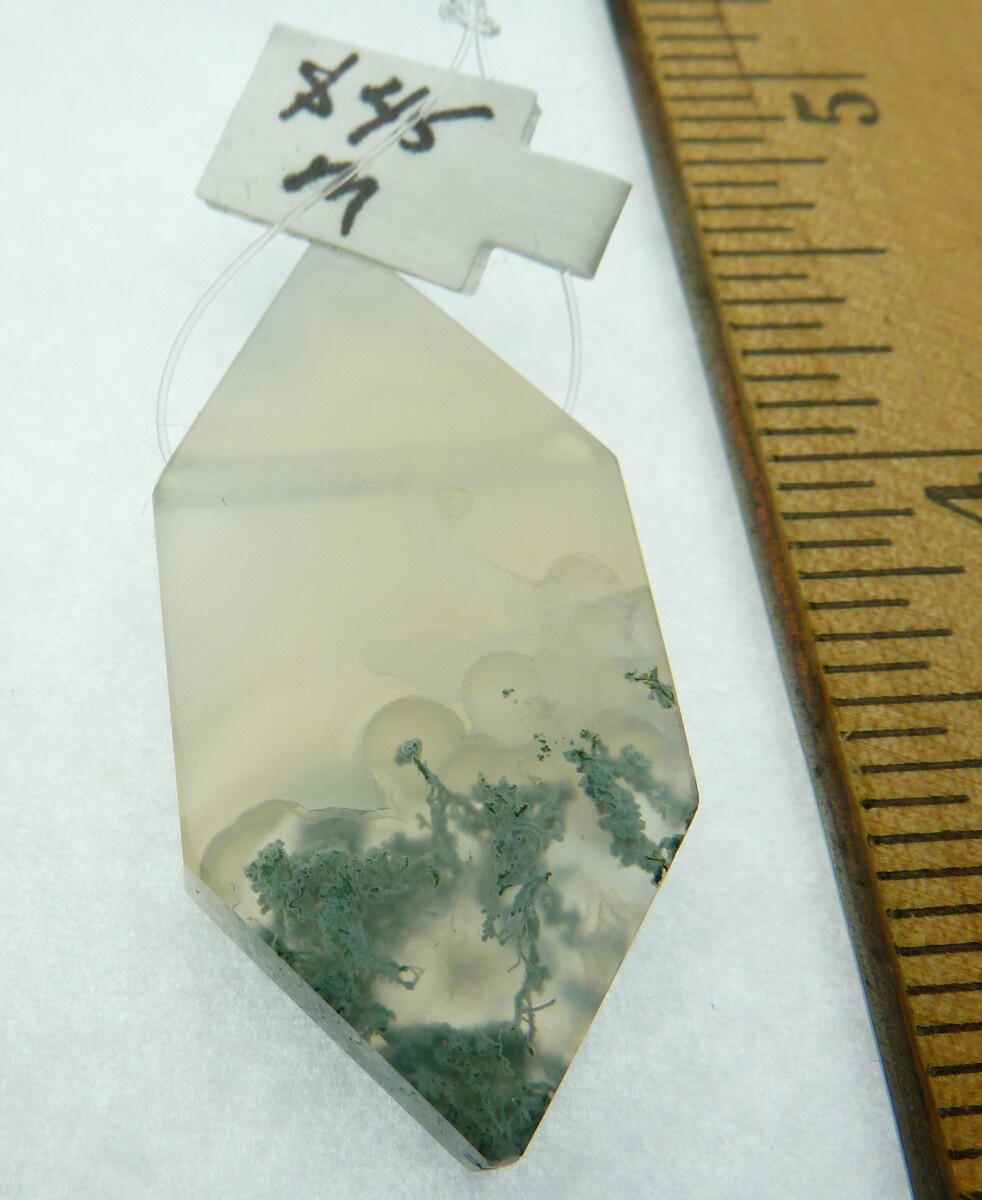 Scaled image P1010942.JPG: Item #MossAgate1, Price $45.00 Designer handcut Moss Agate pendant. Bead is 44 mm long by 21 mm wide. Drill hole size is about 2.0 mm. This stone is drilled horizontally.� 