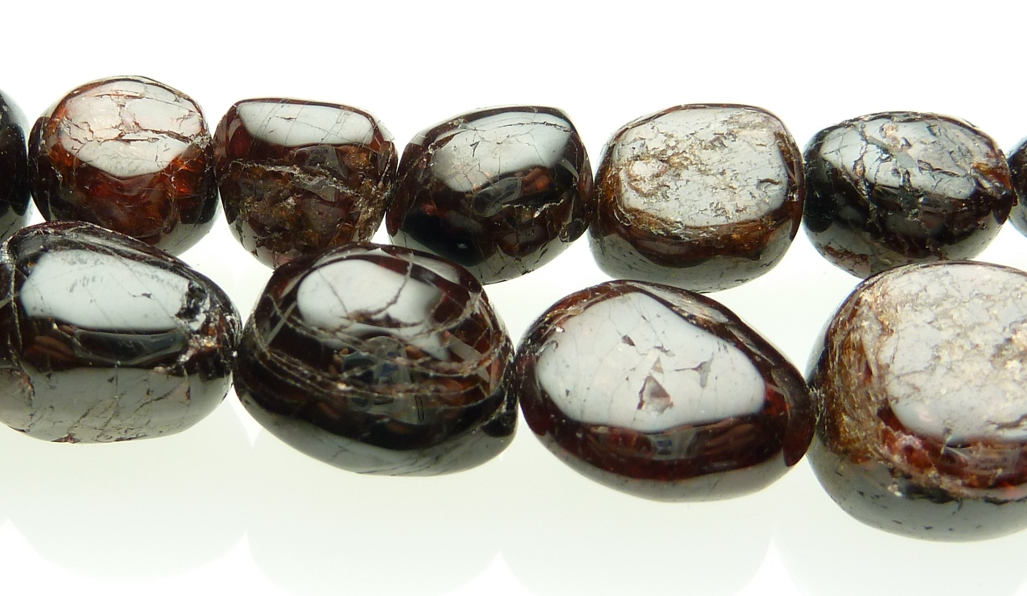 Scaled image P1020179.JPG: Item #GarnNug2. Dark opaque garnet nuggets vary in size from 15x11 to 15x13mm. Price $28.00 per strand. Length 15.5 inches. P1020307.JPG ----Item # AmazOval. Large amazonite ovals. Beautiful rich springtime color. Price $ per strand. Length 16 inches.  � 