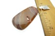 Thumbnail P1010996.JPG: Item #LagunaAG1, Price $90.00 Large and beautiful Laguna Agate with a druzy quartz center. The agate bandng on this stone is stunning! Bead is 45mm long by 24mm wide. Bead is drilled at the narrow part of the stone and drill hole size is about 1.5 mm.  